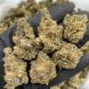 Blue Dream Strain premium cannabis flower with frosty trichomes and bright green buds.